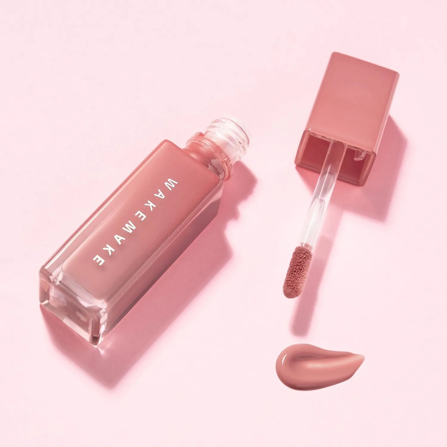 WAKE MAKE Sheer Glow Liquid Blusher 7g with applicator on a pink background