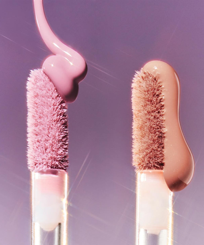 WAKE MAKE Sheer Glow Liquid Blusher 7g applicators with shades on a purple background