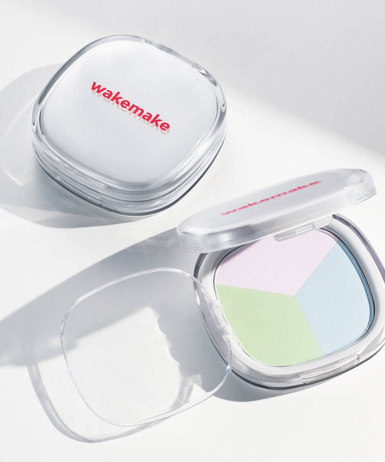 WAKE MAKE Stay Fixer Multi Color Patc 8.6g compact open with pastel color sections and closed compact on white background.