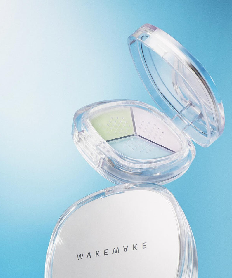 WAKE MAKE Stay Fixer Multi Color Powder 4g in compact case with mirror, perfect for setting makeup and achieving a flawless finish.