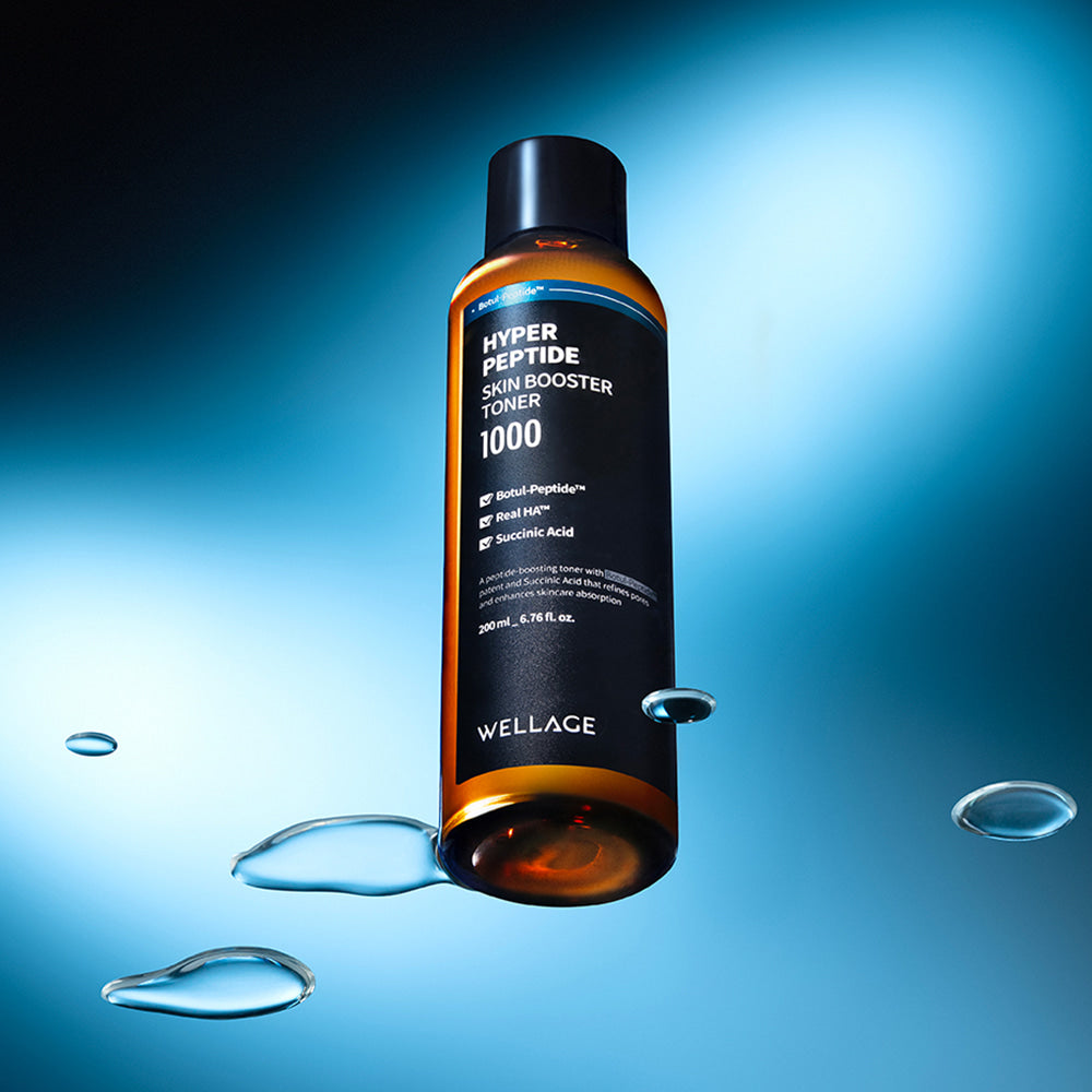 Bottle of WELLAGE Hyper eptide Skin booster Toner 200ml with water droplets on a blue background