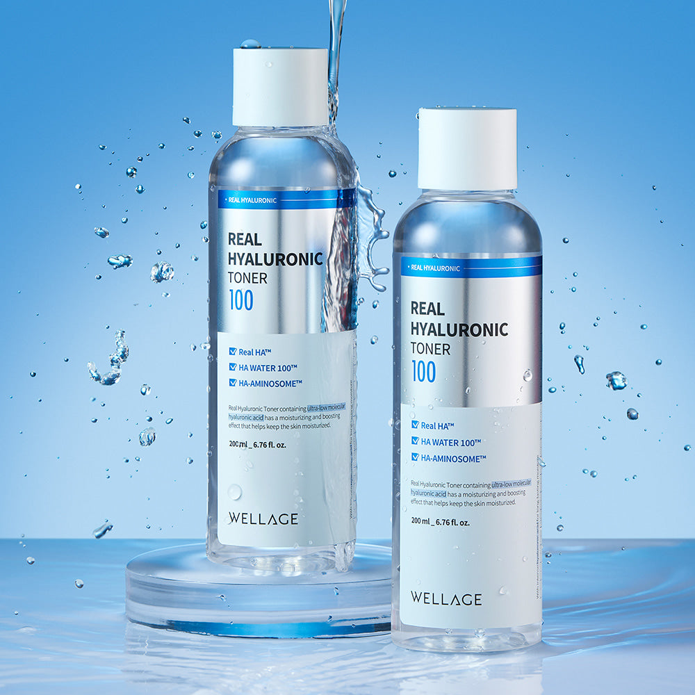 WELLAGE Real Hyaluronic 100 Toner 200ml bottles with water droplets highlighting hydration benefits.