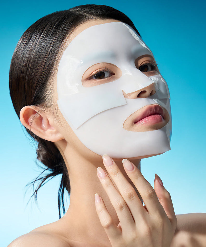 Woman wearing WELLAGE Real hyaluronic Glow Booster PDRN Mask 5 Sheets for skincare