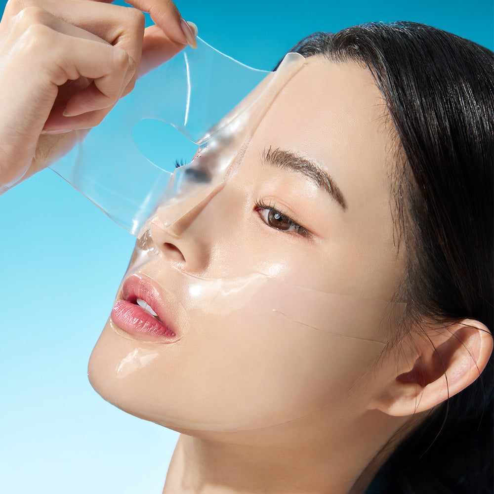 Woman applying WELLAGE Real hyaluronic Glow Booster PDRN Mask 5 Sheets