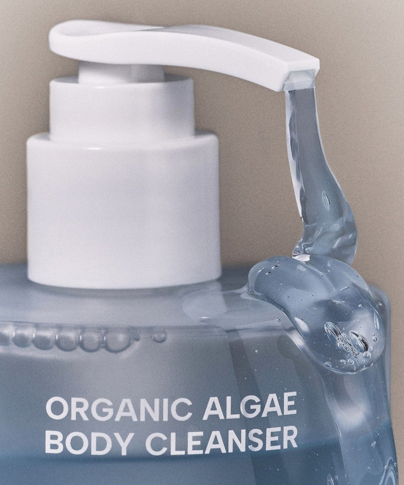 WHAMISA Organic Algae Fermented Body Cleanser 490ml bottle with pump showing texture of cleanser