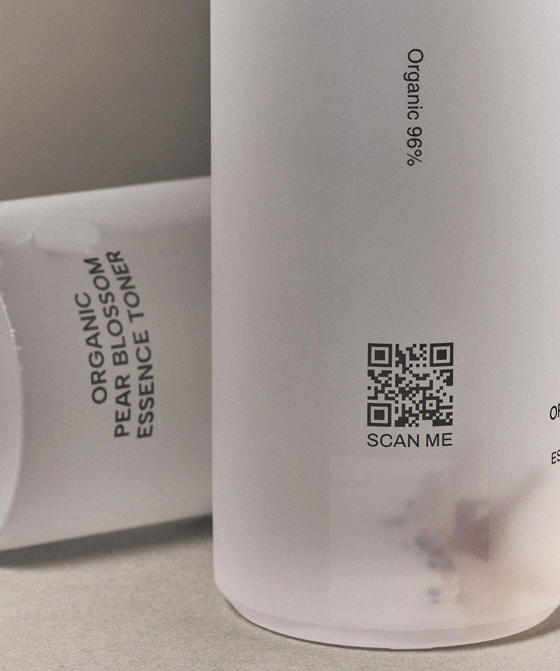 WHAMISA Organic Pear Blossom Fermented Essence Toner 160ml bottle with label and QR code for organic skincare.