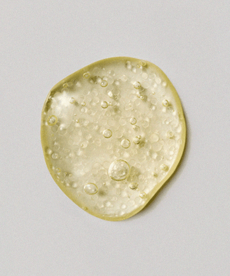 Texture of XOUL Micro Derma Booster 30ml serum showing gel-like consistency with bubbles