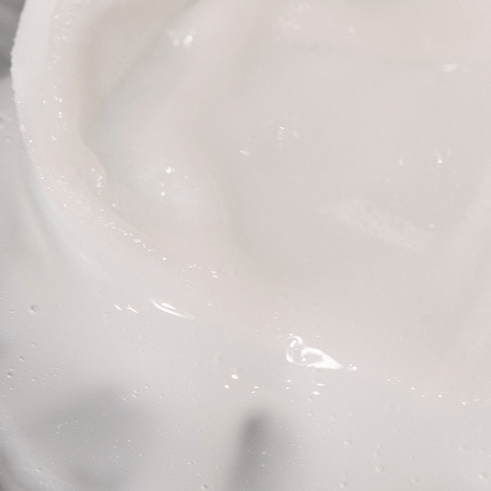 XOUL Secret Solution Cream Mask 15p texture detail showcasing creamy consistency and smooth surface for skincare.